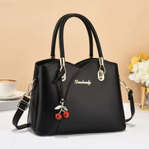 Bolsa Feminina Tiracolo Média em Couro Estampada