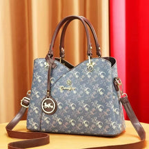 Bolsa Feminina Tiracolo Média em Couro Estampada