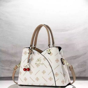 Bolsa Feminina Tiracolo Média em Couro Estampada